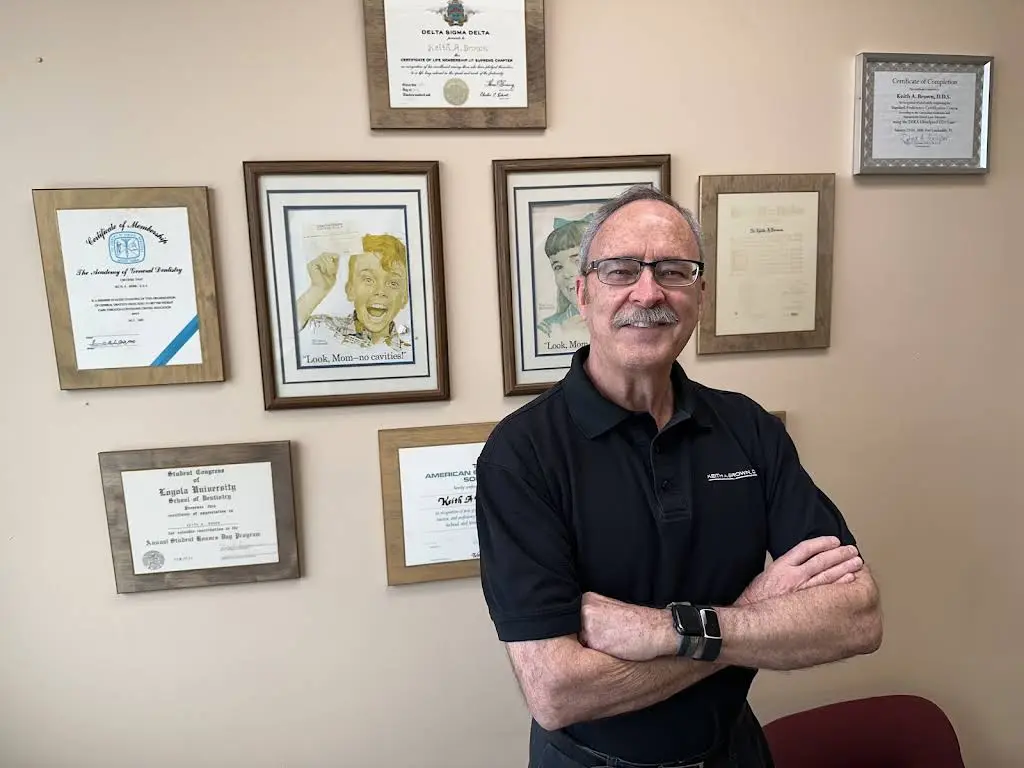 Dr. Keith Brown DDS, FAGD | Naperville Family & Emergency Dentist - Professional dental clinic exterior with modern facilities
