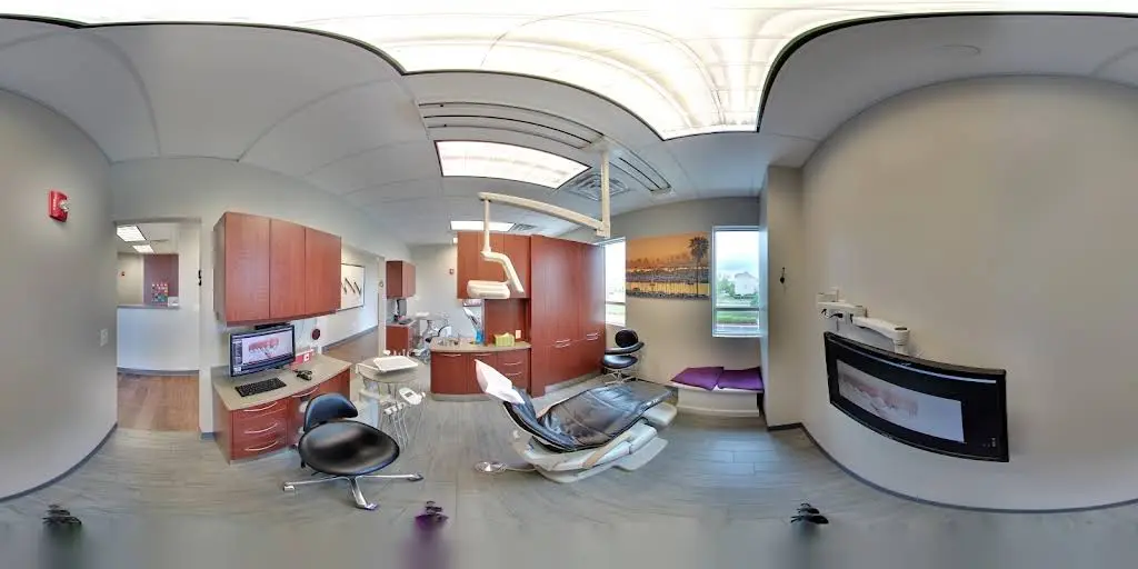 Aurora Orthodontics and Periodontics - Professional dental clinic exterior with modern facilities