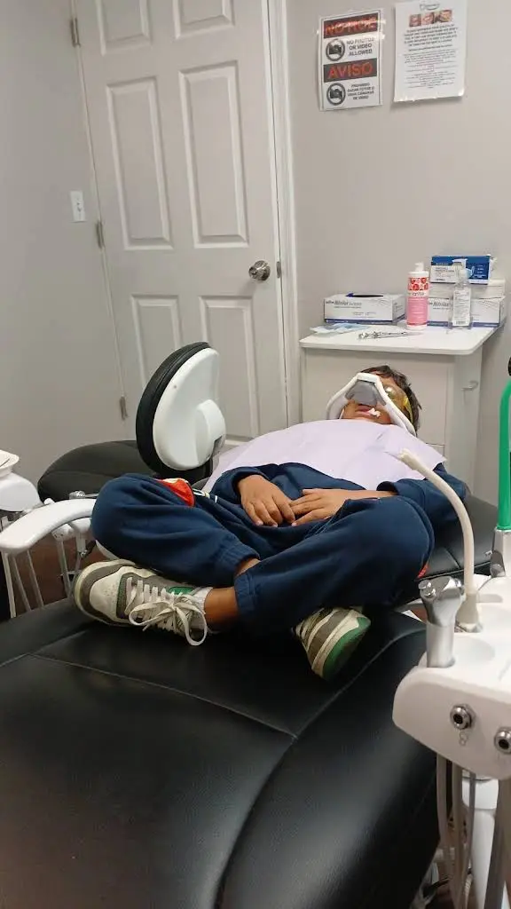 Grand Smiles - Professional dental clinic exterior with modern facilities