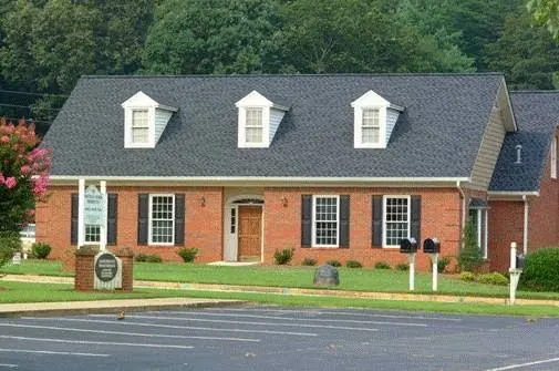 NE Georgia Periodontics & Center for Dental Implants - Professional dental clinic exterior with modern facilities