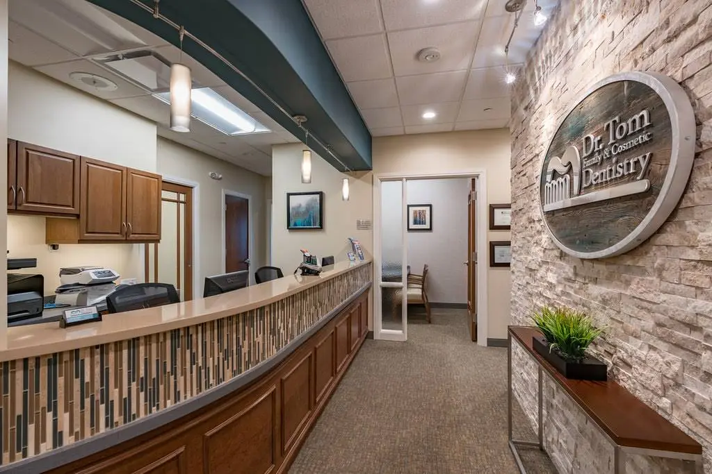 Dr. Tom Family & Cosmetic Dentistry - Professional dental clinic exterior with modern facilities