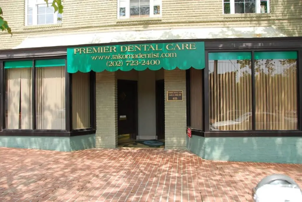 Premier Dental Care - Professional dental clinic exterior with modern facilities
