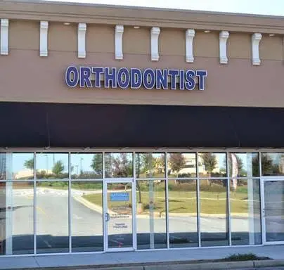 National Orthodontics - Professional dental clinic exterior with modern facilities