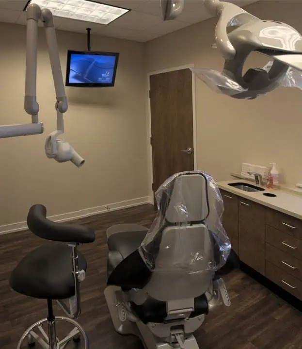 Advanced Dental & Implant Care - Professional dental clinic exterior with modern facilities