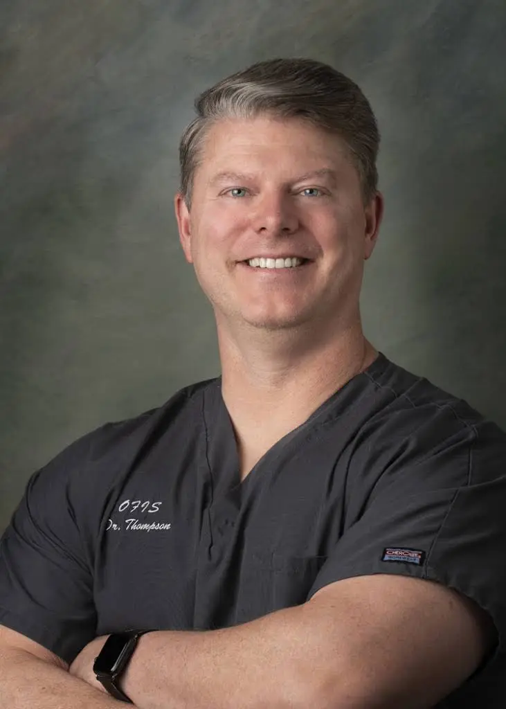 Oral Facial and Implant Specialists - Professional dental clinic exterior with modern facilities