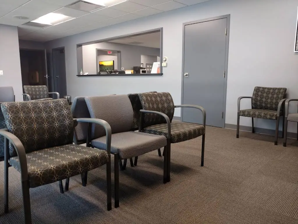 Associated Oral & Maxillofacial Surgeons - Professional dental clinic exterior with modern facilities