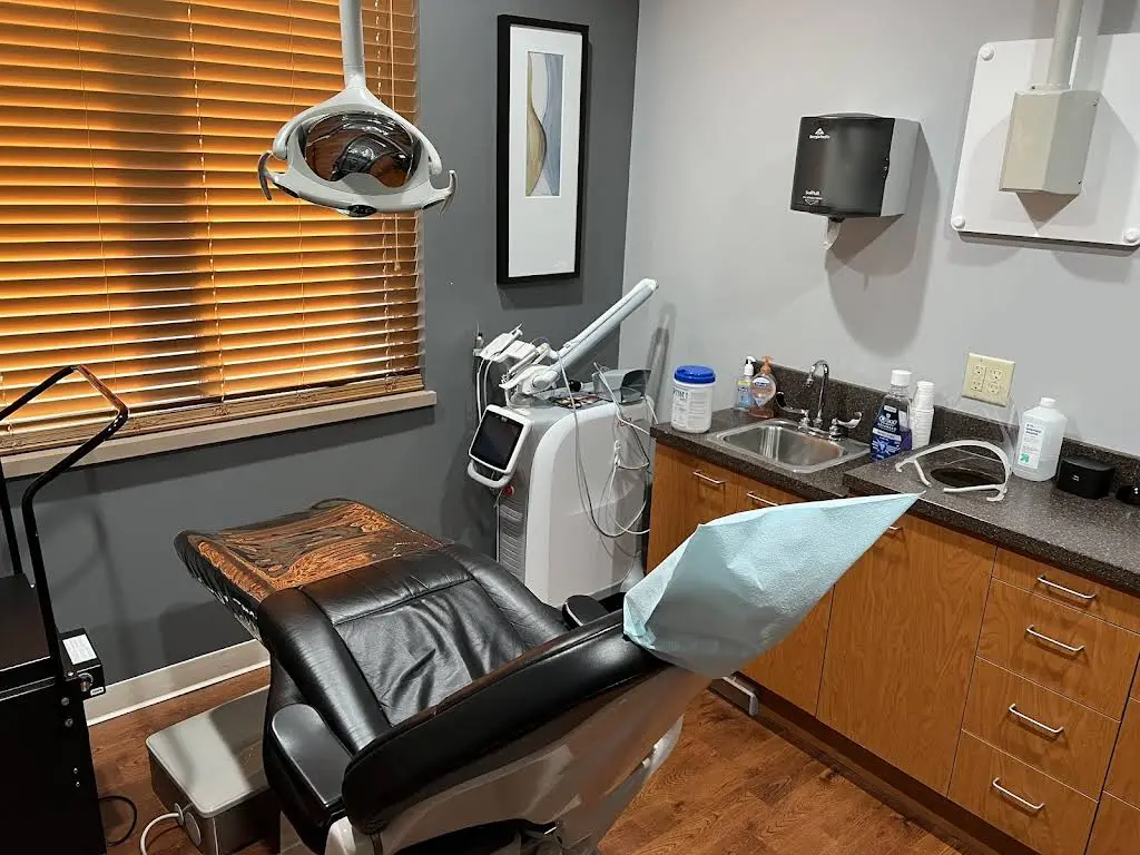 Muna Strasser DDS, PC - Professional dental clinic exterior with modern facilities