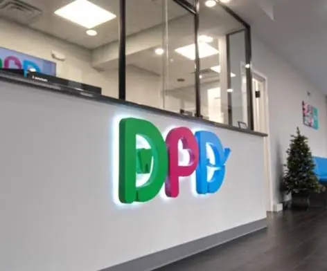 DPD Smiles - Pediatrics & Orthodontics - Professional dental clinic exterior with modern facilities