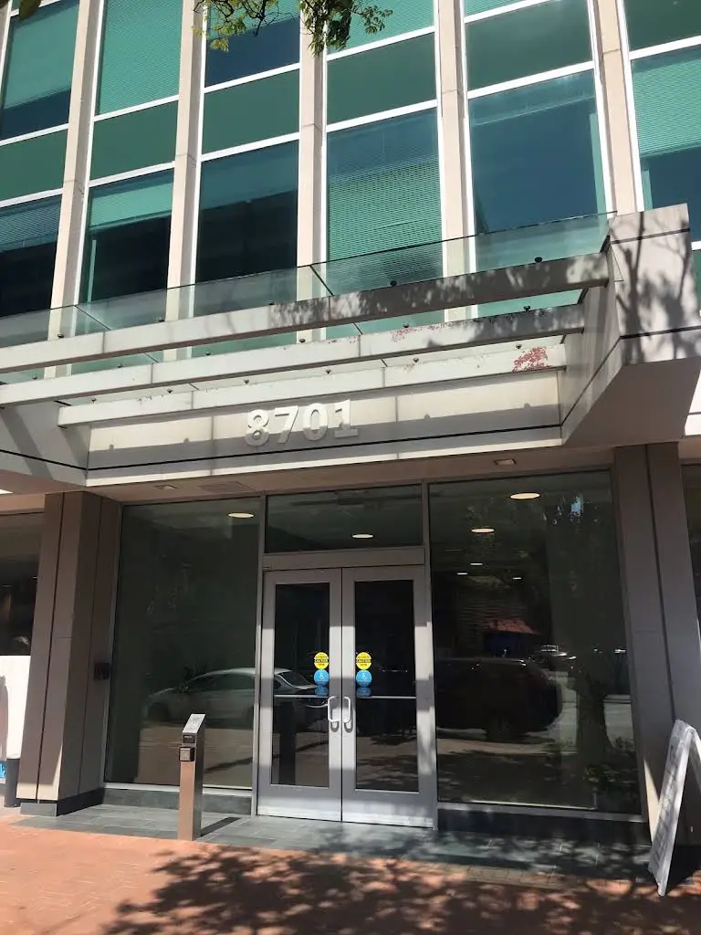 Gums Dental Care, LLC - Professional dental clinic exterior with modern facilities