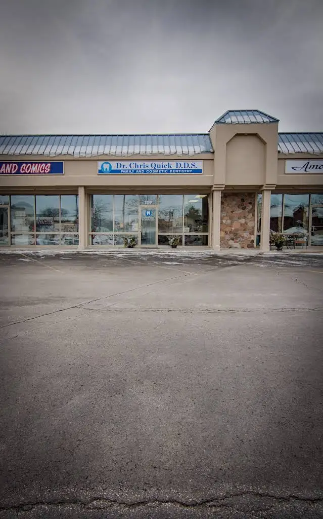 Dr. Christopher B. Quick, DDS - Professional dental clinic exterior with modern facilities