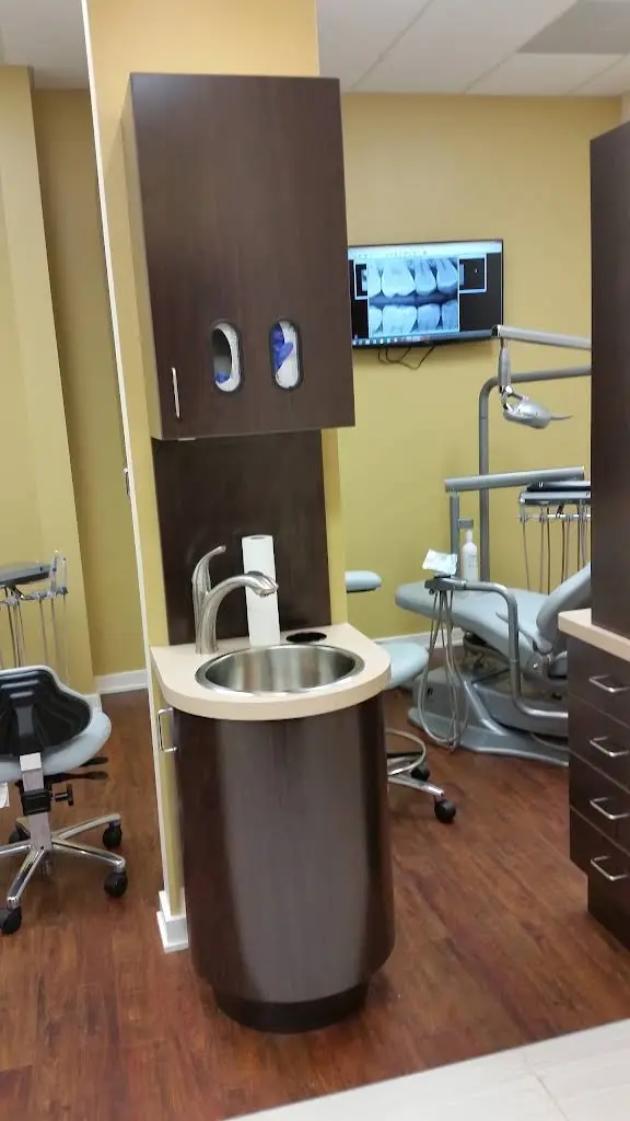 ExcelCare Dental - Professional dental clinic exterior with modern facilities