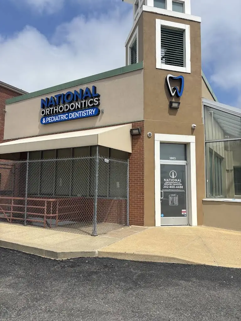 National Orthodontics and Pediatric Dentistry - Professional dental clinic exterior with modern facilities