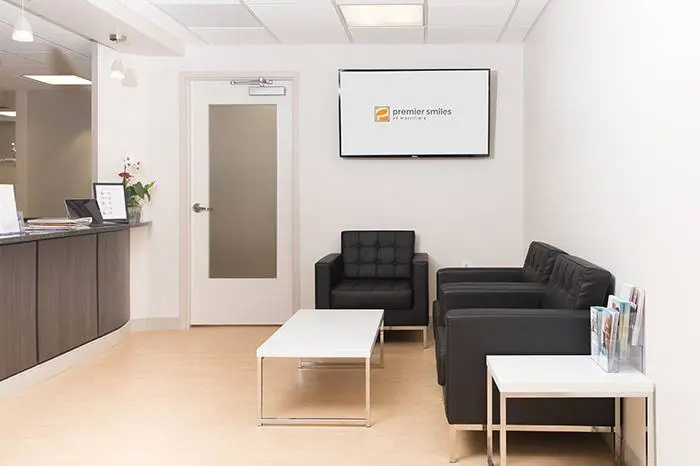 Premier Smiles - Professional dental clinic exterior with modern facilities