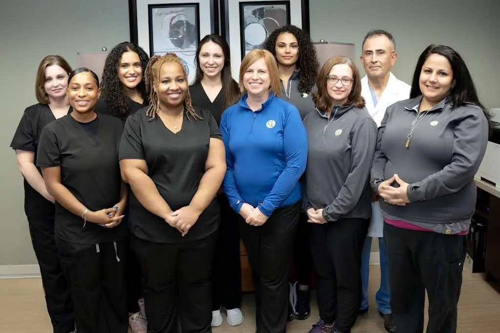 Drs. Delgado & Kuzmik, P.C. - Professional dental clinic exterior with modern facilities