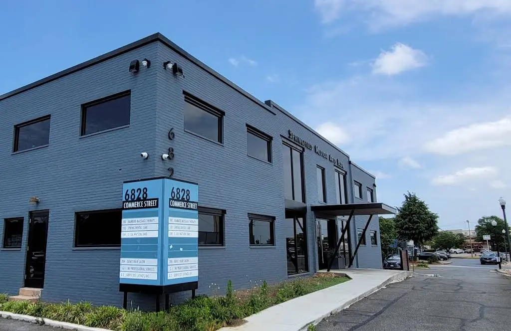 Spring Dental Care - Professional dental clinic exterior with modern facilities