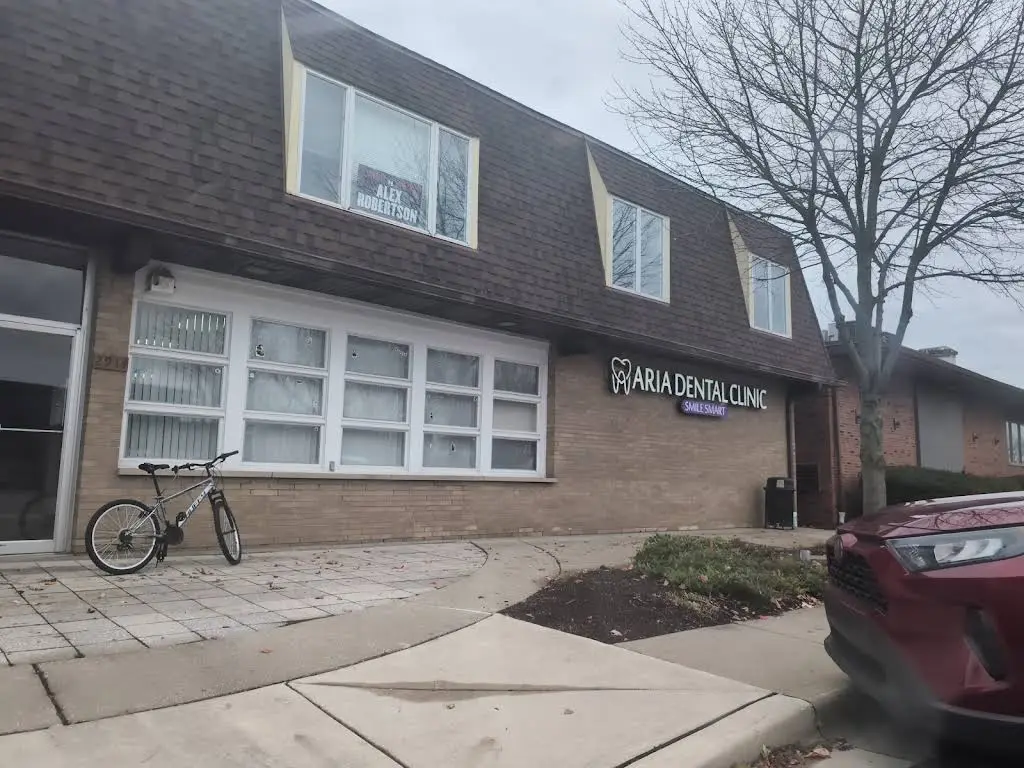 Aria Dental Clinic - Professional dental clinic exterior with modern facilities
