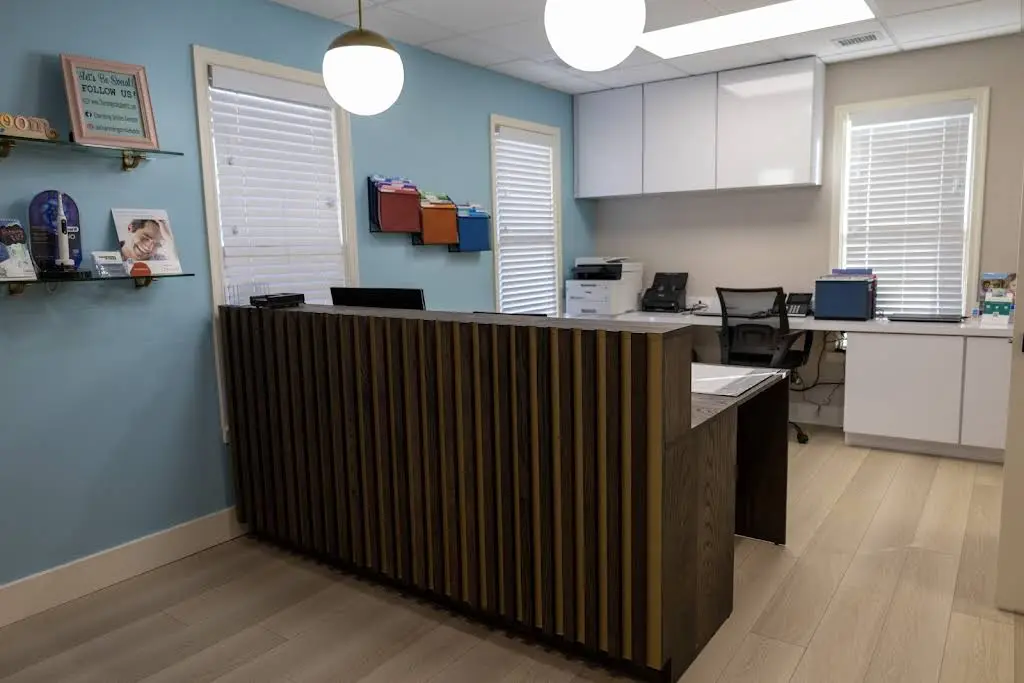 Charming Smiles Family Dentistry - Professional dental clinic exterior with modern facilities
