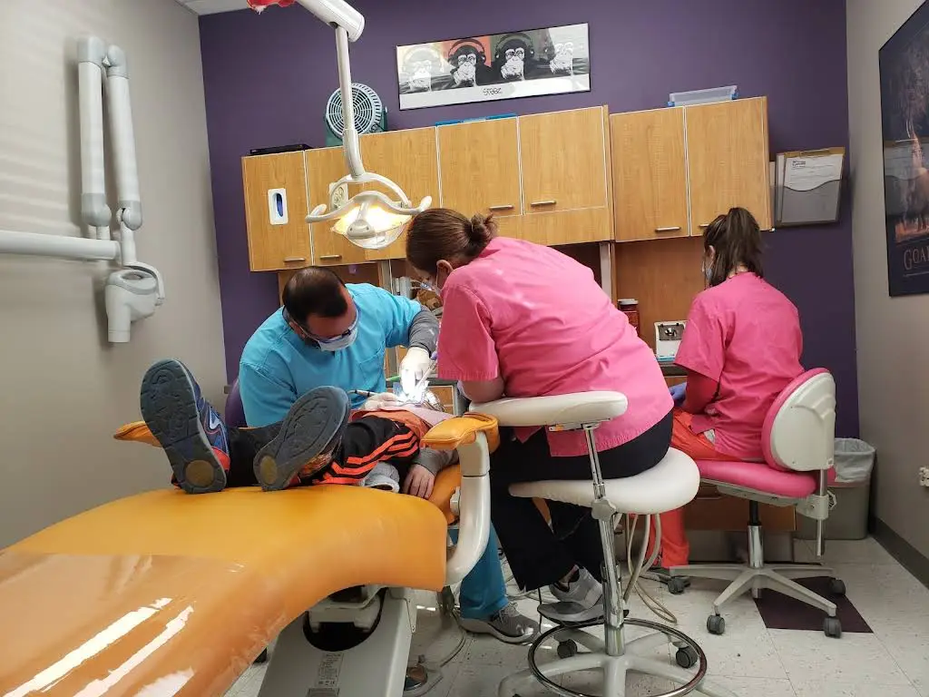 Malcolm Pediatric Dentistry - Professional dental clinic exterior with modern facilities