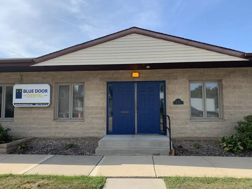 Blue Door Dental - Professional dental clinic exterior with modern facilities