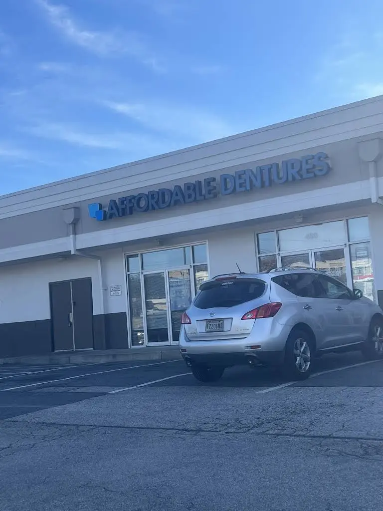 Affordable Dentures & Implants - Professional dental clinic exterior with modern facilities