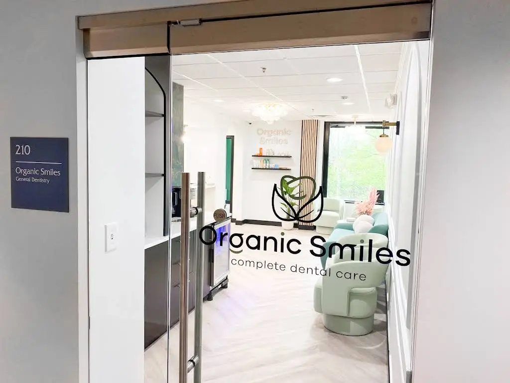 Organic Smiles - Professional dental clinic exterior with modern facilities