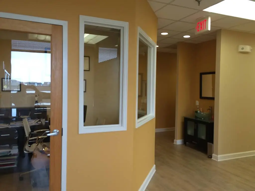 Smile Dental Studio, LLC - Professional dental clinic exterior with modern facilities