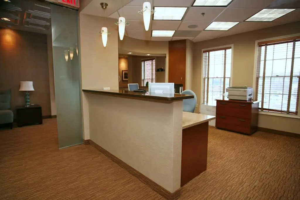 Bradley Olson DDS / Smile Images - Professional dental clinic exterior with modern facilities