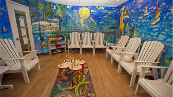 We Make Kids Smile - Professional dental clinic exterior with modern facilities