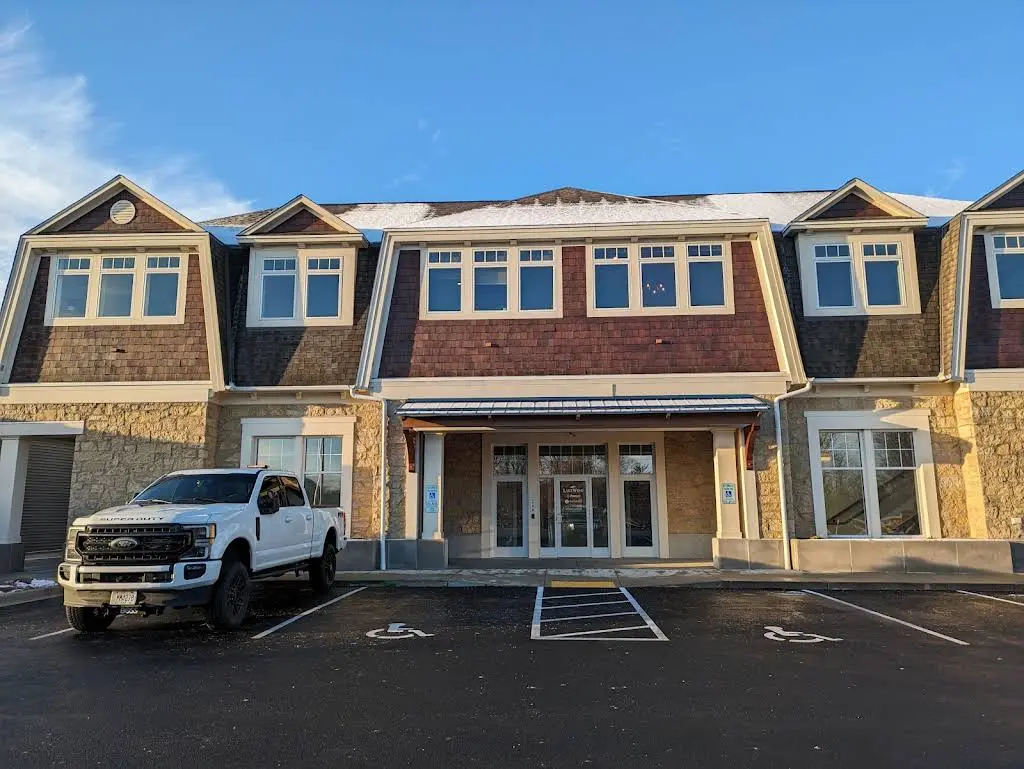 wholeHEALTH Biomimetic and Biological Family Dentistry - Professional dental clinic exterior with modern facilities