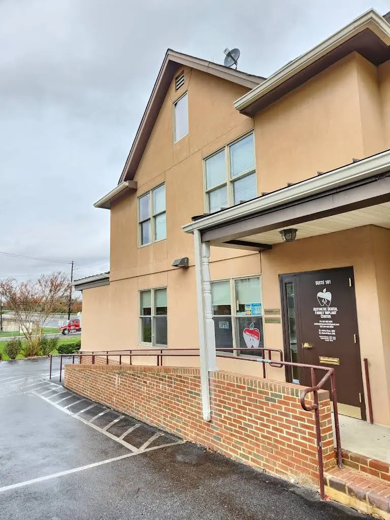 Aesthetic Family Dental & Implant Center - Professional dental clinic exterior with modern facilities