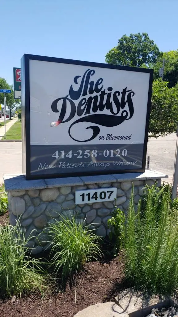 The Dentists On Bluemound - Professional dental clinic exterior with modern facilities