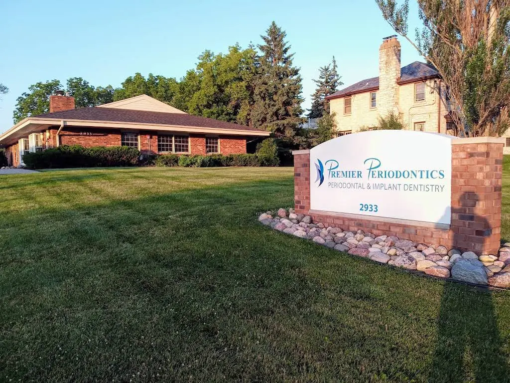 Premier Periodontics - Professional dental clinic exterior with modern facilities
