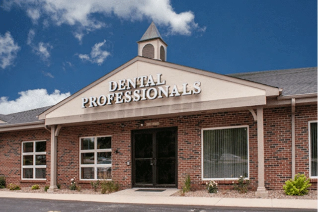Dental Professionals - Professional dental clinic exterior with modern facilities