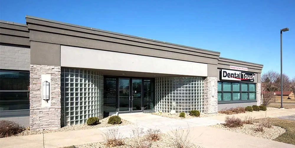 Dental Touch Associates - Professional dental clinic exterior with modern facilities