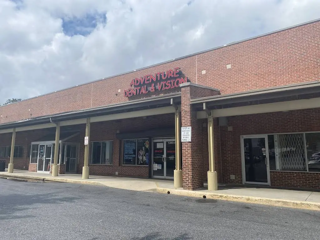 Adventure Dental and Vision - Professional dental clinic exterior with modern facilities
