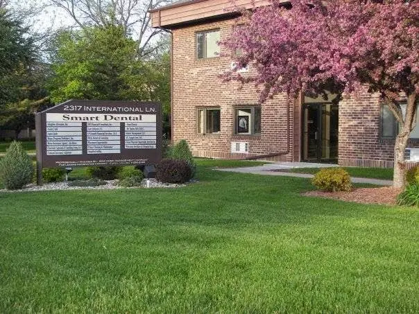 Smart Dental - Professional dental clinic exterior with modern facilities