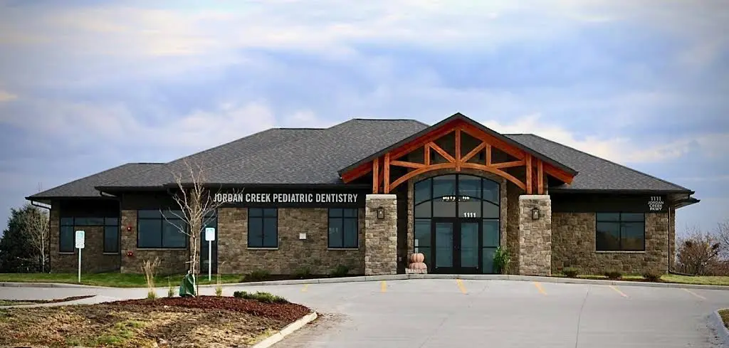 Jordan Creek Pediatric Dentistry - Professional dental clinic exterior with modern facilities
