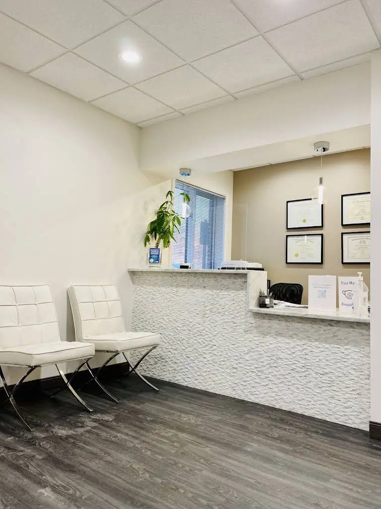Smiles By Design - Professional dental clinic exterior with modern facilities