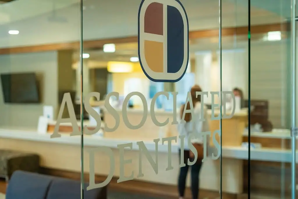 Associated Dentists - Professional dental clinic exterior with modern facilities