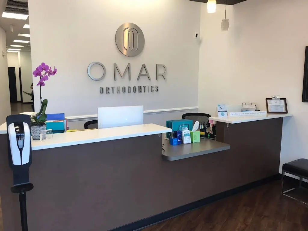 Omar Orthodontics - Professional dental clinic exterior with modern facilities
