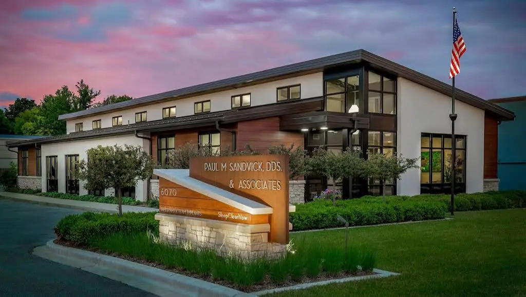 Paul M. Sandvick, DDS & Associates - Professional dental clinic exterior with modern facilities