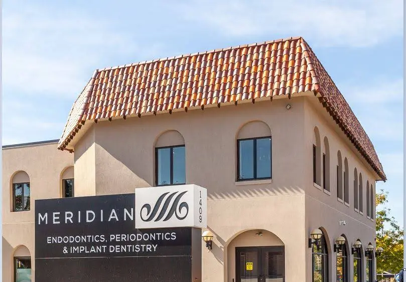 Meridian Endodontics, Periodontics & Implant Dentistry - Professional dental clinic exterior with modern facilities