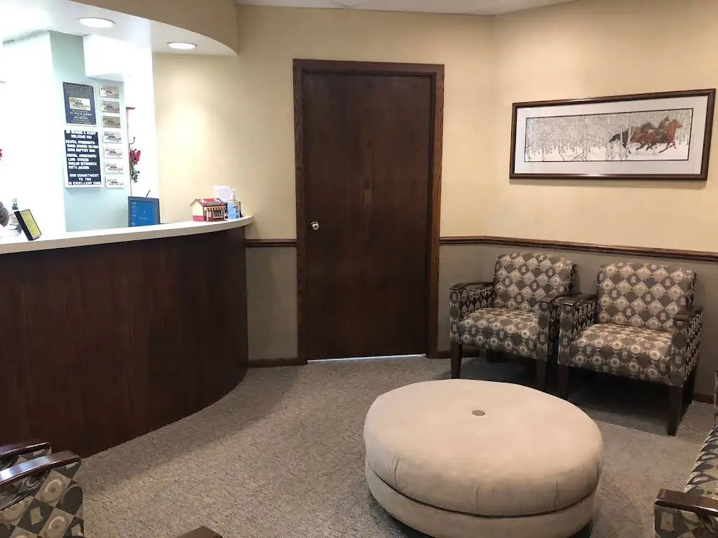 Dale R Schmid DDS PC - Professional dental clinic exterior with modern facilities