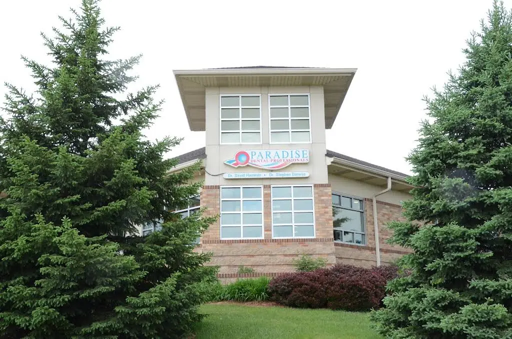 Paradise Dental Professionals - Professional dental clinic exterior with modern facilities