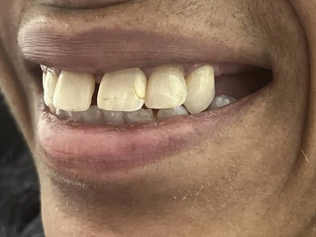 Love Your New Smile - Dr. Peter Diacoloukas - Professional dental clinic exterior with modern facilities
