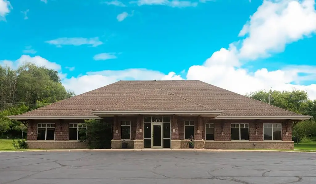 Coulee Region Implants and Oral Surgery Center - Professional dental clinic exterior with modern facilities