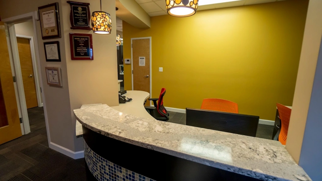 Family, Cosmetic & Implant Dental Care - Professional dental clinic exterior with modern facilities