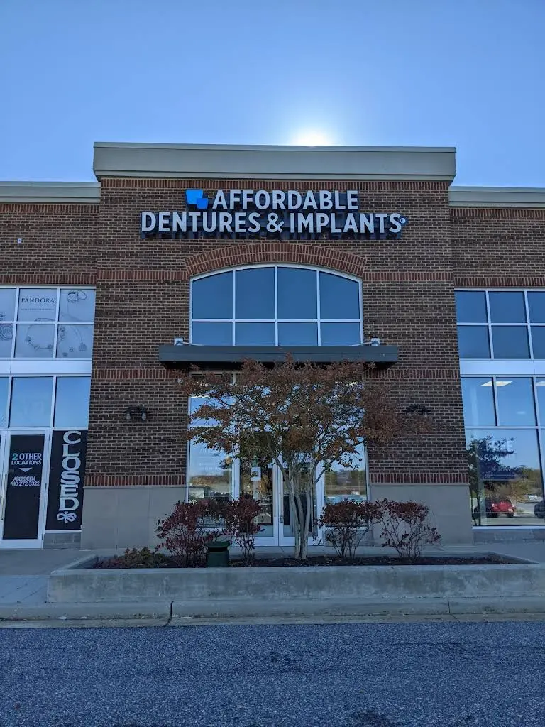 Affordable Dentures & Implants - Professional dental clinic exterior with modern facilities