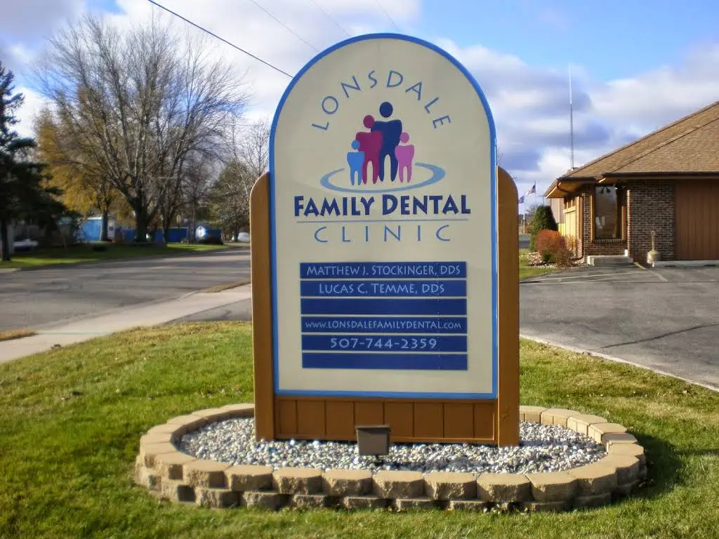 Lonsdale Family Dental Clinic - Dr. Matthew Stockinger, DDS - Professional dental clinic exterior with modern facilities