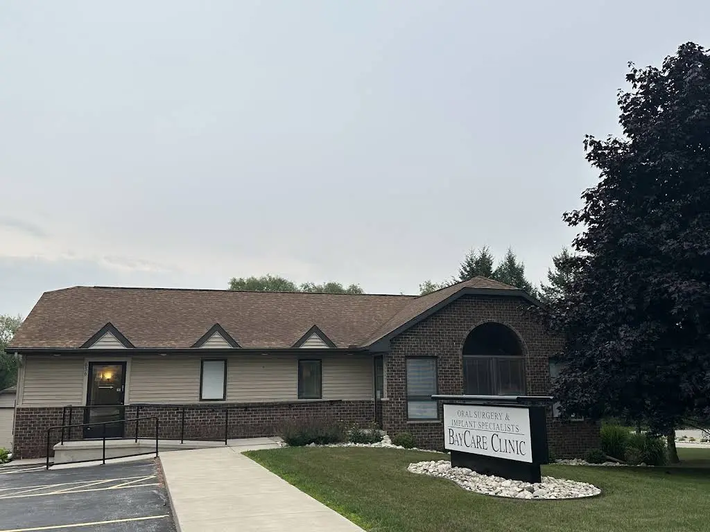 Oral Surgery & Implant Specialists BayCare Clinic - Professional dental clinic exterior with modern facilities
